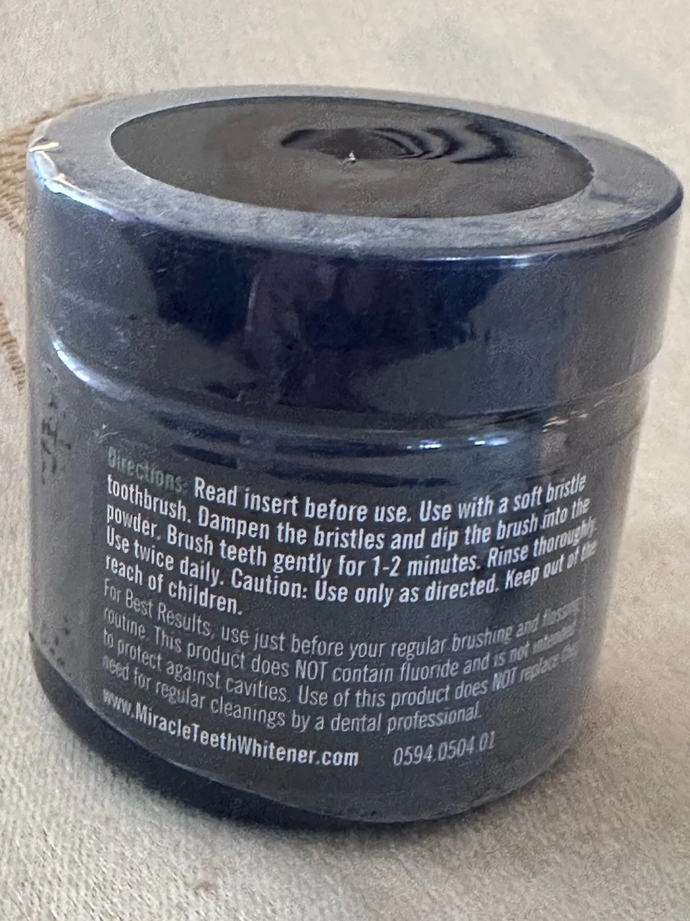 MIRACLE TEETH WHITENER ACTIVATED COCONUT CHARCOAL POWDER.
